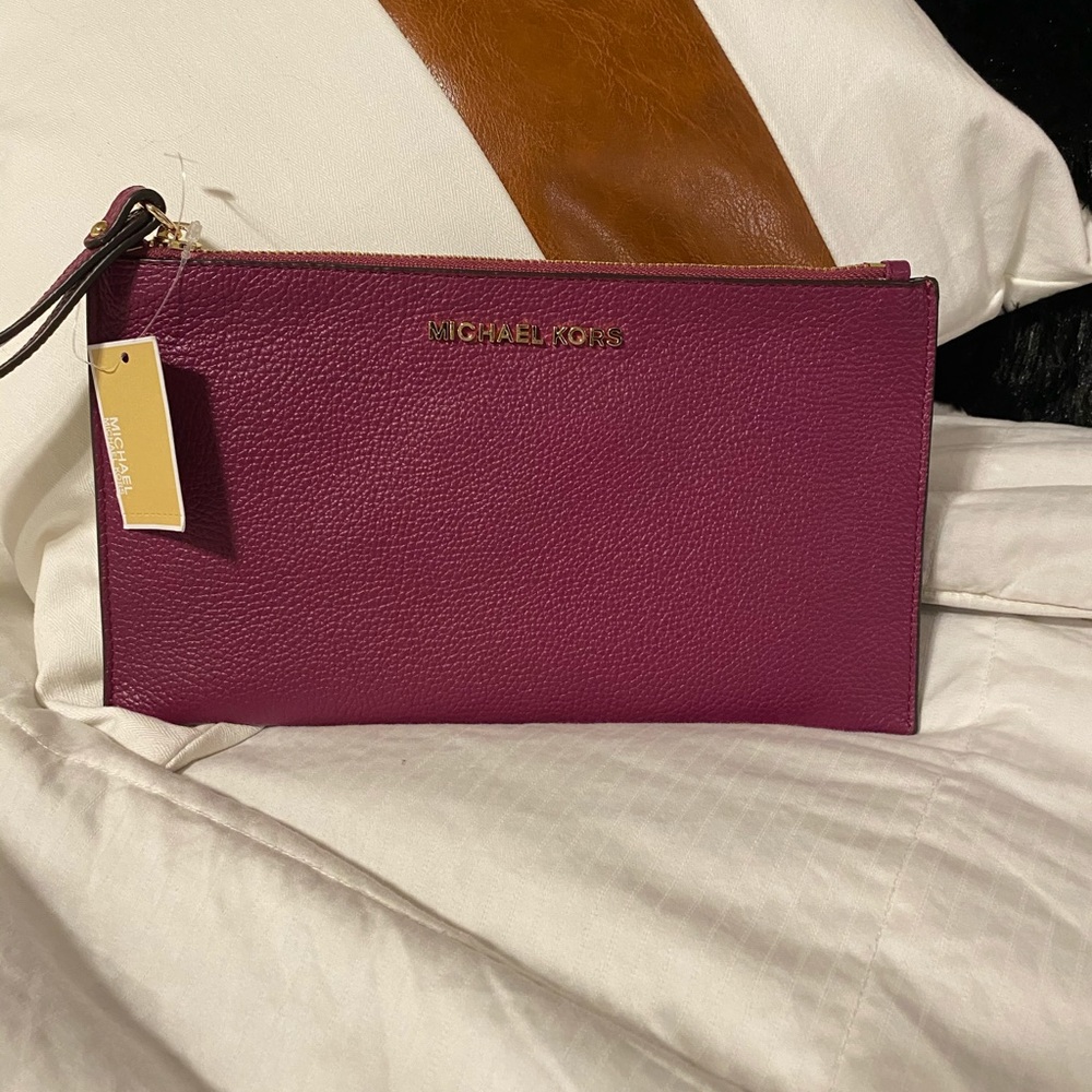 Magenta Michael Kors wristlet